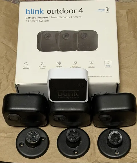 Blink Outdoor 4 Smart Security Cameras, 3 Cameras with Sync Module