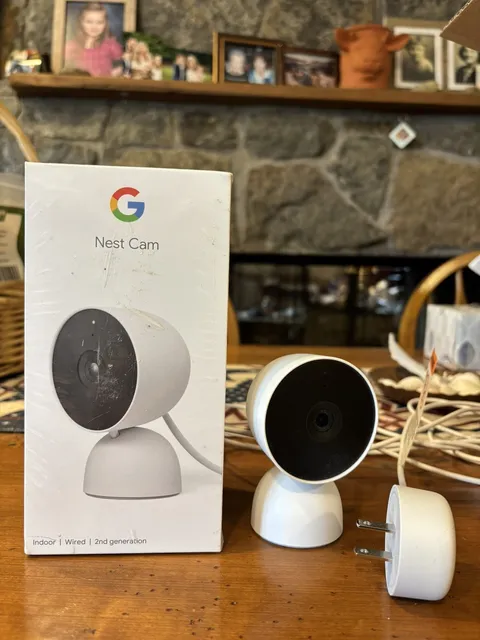 Two new Nest Cam Indoor Cameras 2nd  Generation white Qty 2 cameras  1 opened