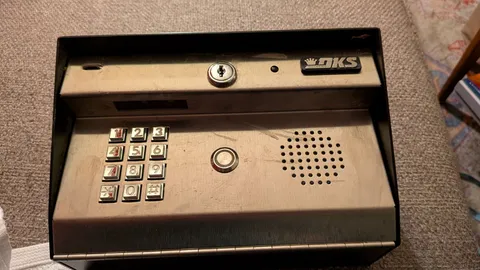 DKS DoorKing 1812-090 Access Plus Surface-Mount Telephone Entry System 2 keys