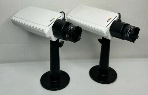 (2) AXIS P1344 CAMERAS 0324-001-02 with Housing W/ SD Card Compatibility