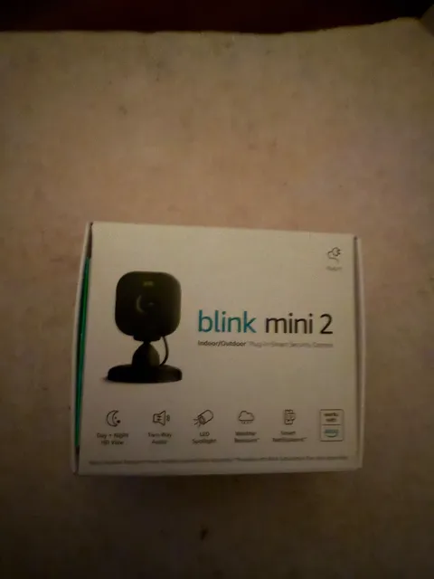 Blink Mini  2 Compact indoor plug-in smart security camera 2k  HD, New/Sealed
