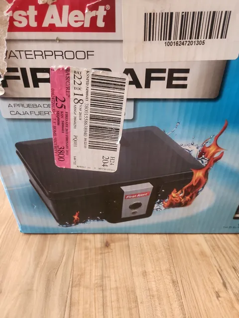 First Alert 0.17 cu ft Key Lock Black Fire Chest Waterproof New Damaged Box