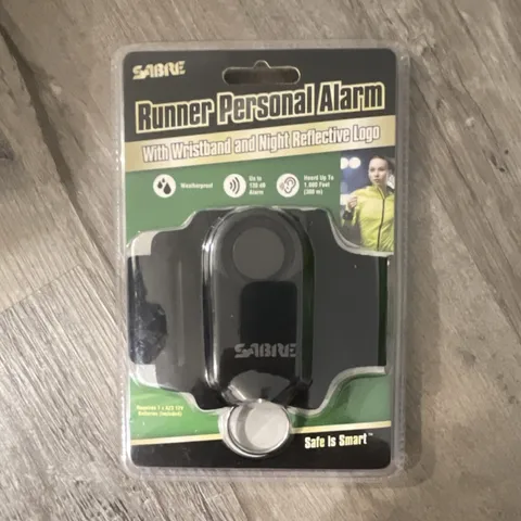 SABRE Runner Personal Alarm 130 dB Black Wristband Night Reflective Logo