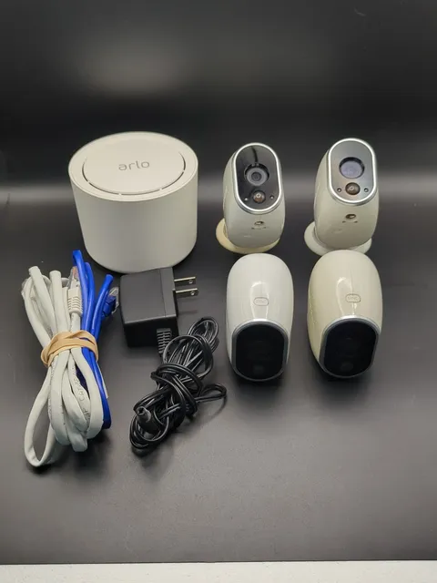 Arlo Base station and Camera's (4) 1st Generation VMC3030  See description