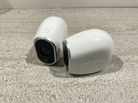 Set of 2 NETGEAR Arlo VMC3030 Wireless Indoor/Outdoor Security Cameras + Battery