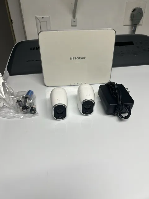 Lot of 2 Netgear Arlo VMC3030 Wireless Security Cameras with Base and batteries