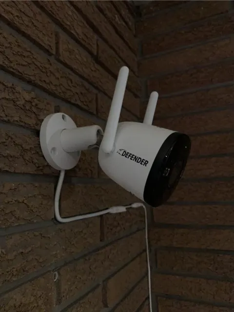 Defender Powered 4K Guard Pro Wi-Fi 6-Plug-in Security Camera In Hand Now