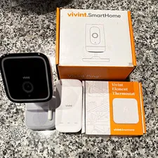 Vivint smartHome equipment 2 cameras one Smart Thermostat