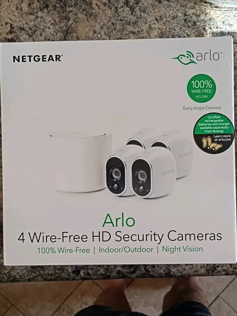 Arlo Wireless Security Cameras (4) VMS3430  by Netgear & 1 Arlo Quadpod Mount