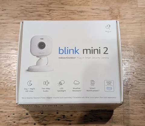 Blink Mini 2 Indoor/Outdoor Plug-In Smart Security Camera. New-Open Box