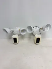 Lot of 2 - Ring Wired Outdoor Floodlight Cameras in White. FOR PARTS, DON’T WORK