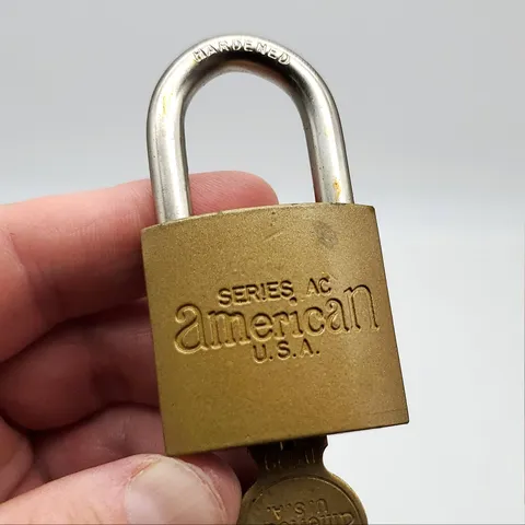 American Lock Padlock AC20 1" L x 5/16" D 1.5" Body Shackle Gold Finish USA Made