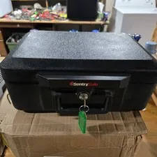 SentrySafe 1200 Fire-Resistant Box Safe with Key Lock 0.18 Cu. ft., Black, used