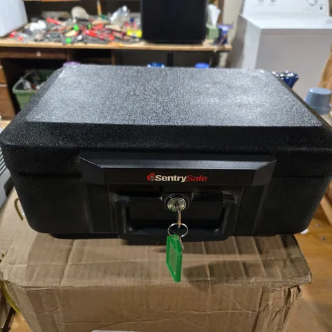 SentrySafe 1200 Fire-Resistant Box Safe with Key Lock 0.18 Cu. ft., Black, used