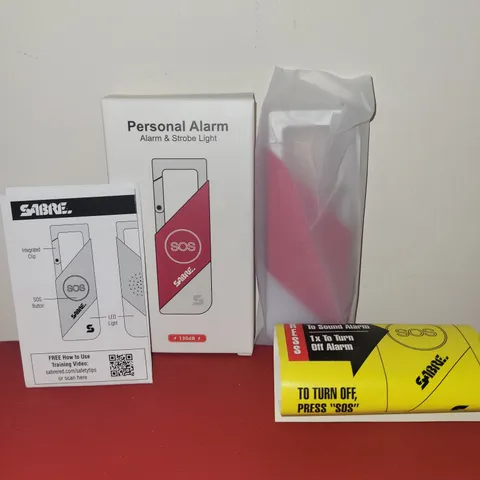 SABRE~ Compact Personal Alarm & Strobe Light + SOS Button w/ Integrated Clip-RED