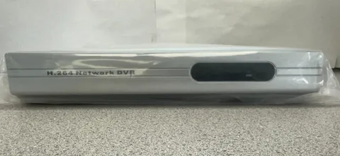 Analog H.264 Network DVR & 4 Cameras - New     4354