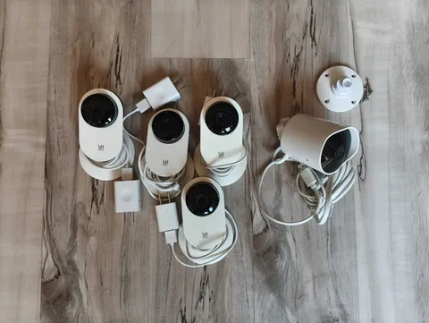 Four Yi Smart 1080p Cameras and One Yi Outdoor 1080p Camera - Bundle