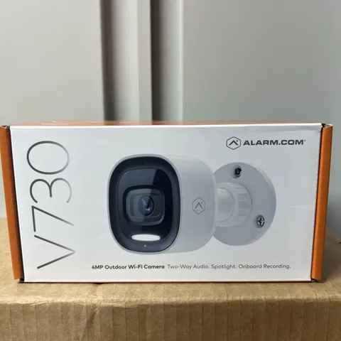 Alarm.com V730 4MP Outdoor Wi‑Fi Camera Spotlight Two‑Way Audio Onboard Rec
