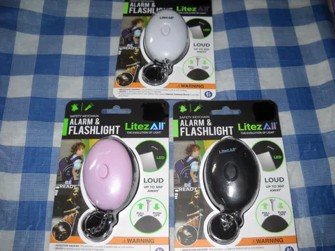 Keychain safety Alarm and Flashlight Choice Black or White or Pink