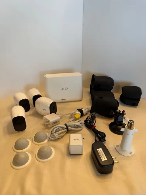 Netgear Arlo Base Station With 4 Cameras, rubber camera covers and mounts