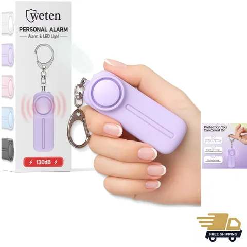 Secure Travel with 130dB Keychain Alarm & LED Flashlight - Stylish Purple Design