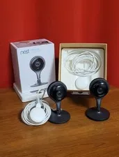 2 Nest Cam Indoor Security Cameras A0005 w/Stands, Cords, Wall Mount Base Plates