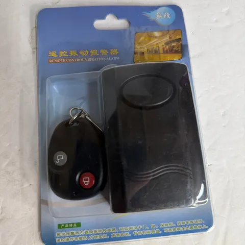 ANTI-THEFT KEYCHAIN REMOTE CONTROL VIBRATION & TONAL ALARM NEW IN BOX
