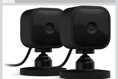 Blink Mini - Compact indoor plug-in smart security camera, 1080p HD/night-2pk