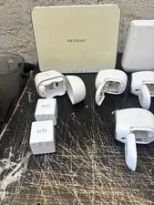 1 NETGEAR Modem1 Arlo 4 Arlo3030 And 2-4030 4 Batteries 1 Magnetic All Works