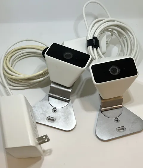 2 (two) Xfinity XW4 Mountable Security Cameras, cords and AC Plug-In