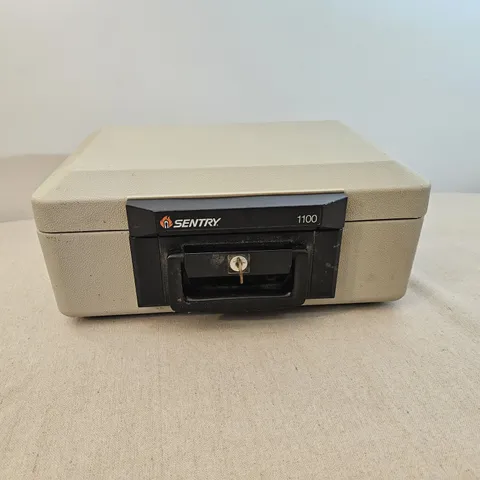 Sentry Safe 1100 Fire Proof Safe with Keys Valuables Portable Lock Box 1 key