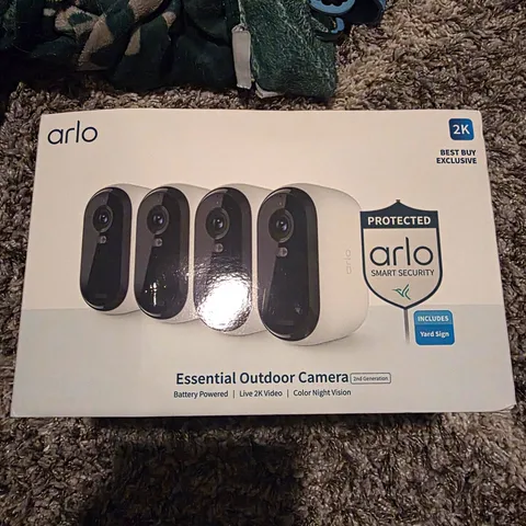 Arlo Essential Outdoor Camera 2nd Gen 2K Wireless Battery 4-Pack Yard Sign