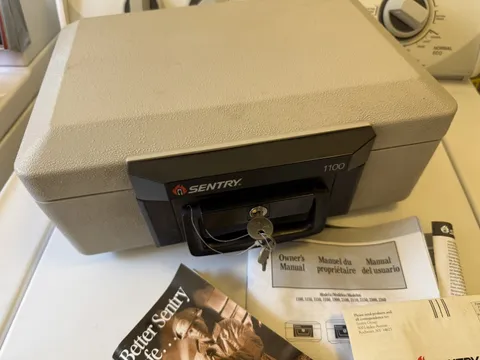 Sentry 1100 Portable Locking  Fire Proof Safe Box with Handle and 2 Keys