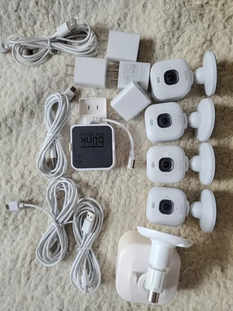 Blink Mini 2 Smart Security Camera 4-Pack Bundle with Sync Module & Accessories