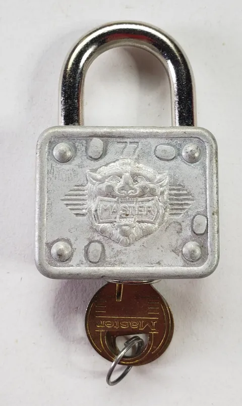 Vintage Master # 77 Padlock Embossed Lion Head Lock with 2 Keys WORKS USA Made