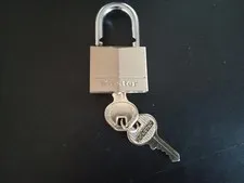 BRASS MASTER LOCK -  MEASURES  1 1/2 X 1 1/4 INCHES - WITH 2 KEYS  NO 140