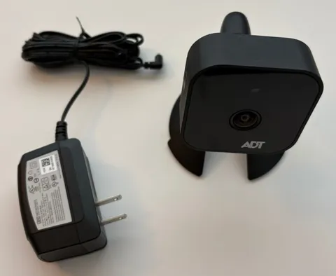 ADT: Wireless Network Camera Model RC8326 W/ Power Cord (For Parts)