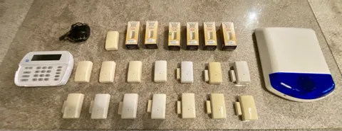 DSC Impassa Wireless Alarm Lot/Bundle – 21 Shock Sensors, Keypad, Outdoor Siren