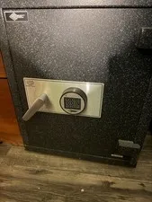 safe that sits on the floor ; 22x21x27; gray with shelf. Fire rated for 1 hour