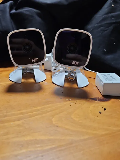 Two ADT RC845 FHD Wireless Indoor Security Cameras w/ Power Adapter