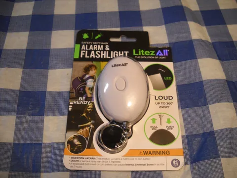 Keychain safety Alarm and Flashlight Choice Black or White
