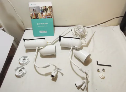 Two Home Monitor Pro IP POE Surveillance Security Cameras. Tested for power