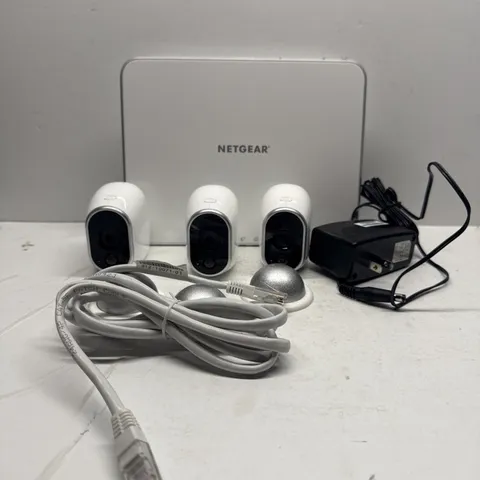 3 Netgear  Wireless Security Cameras And Base Station