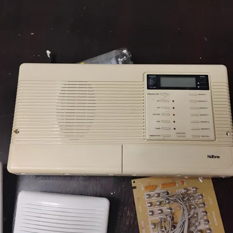 nutone intercom system with AM/FM radio
