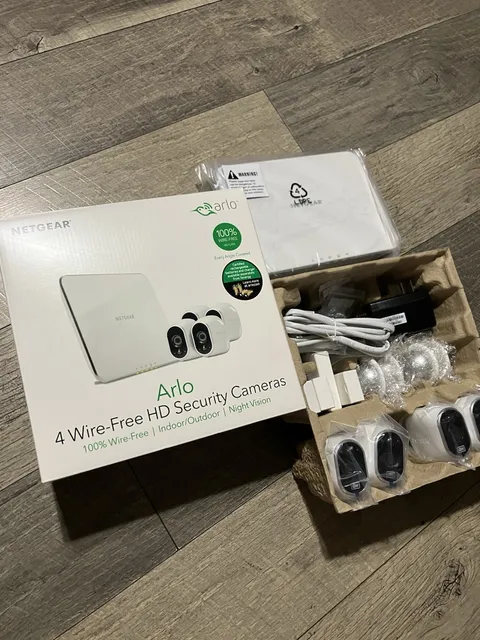 Netgear Arlo 4 wire-free HD Security Cameras VMS3430-100NAS (New, Open Box)