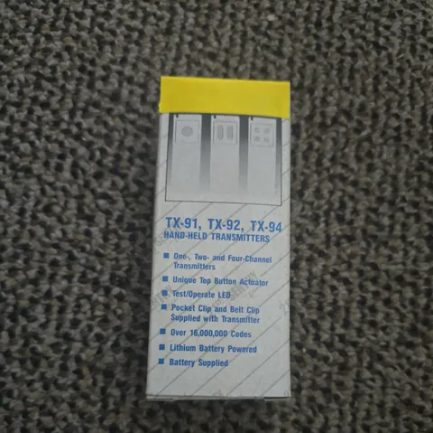 LINEAR TX-91 HAND HELD REMOTES SUPERVISED TRANSMITTERS  NEW IN BOX.