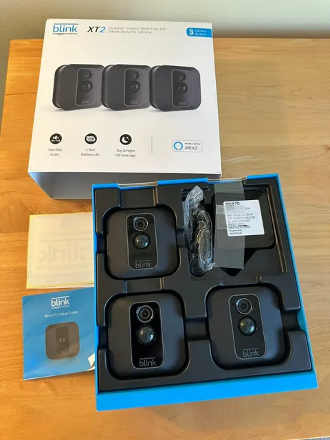 Blink XT2 Security Cameras System - 3 Camera & Sync Module-**FOR PARTS-LOCKED**