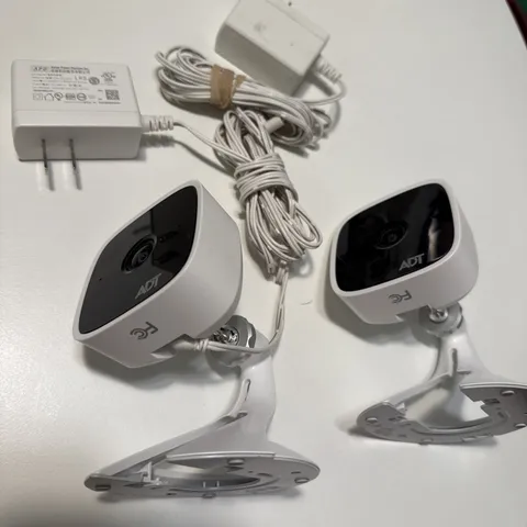 2 ADT RC845 FHD Wireless Indoor Security Cameras w/ Power Adapters