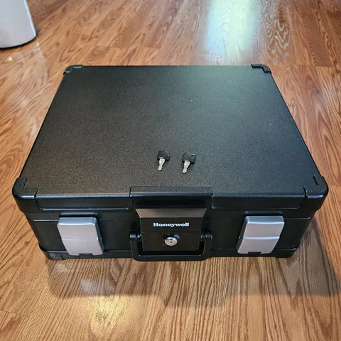 Honeywell 1114 Fire and Waterproof Chest with Key Lock 0.39 cu ft. Black 