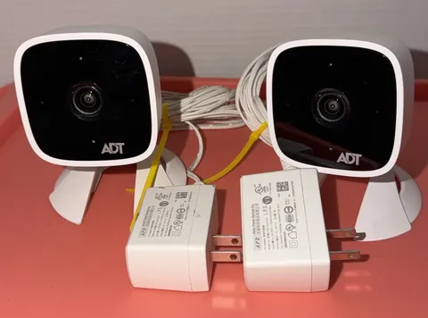 2 ADT RC845 FHD Wireless Indoor Security Cameras w/ Power Adapters